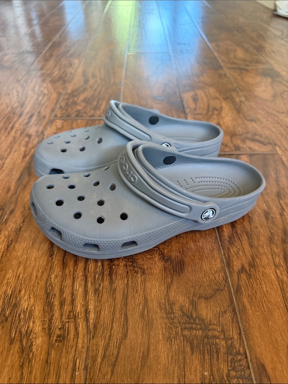 CROCS Classic Clog in Gray, size women’s 9 and men’s 7